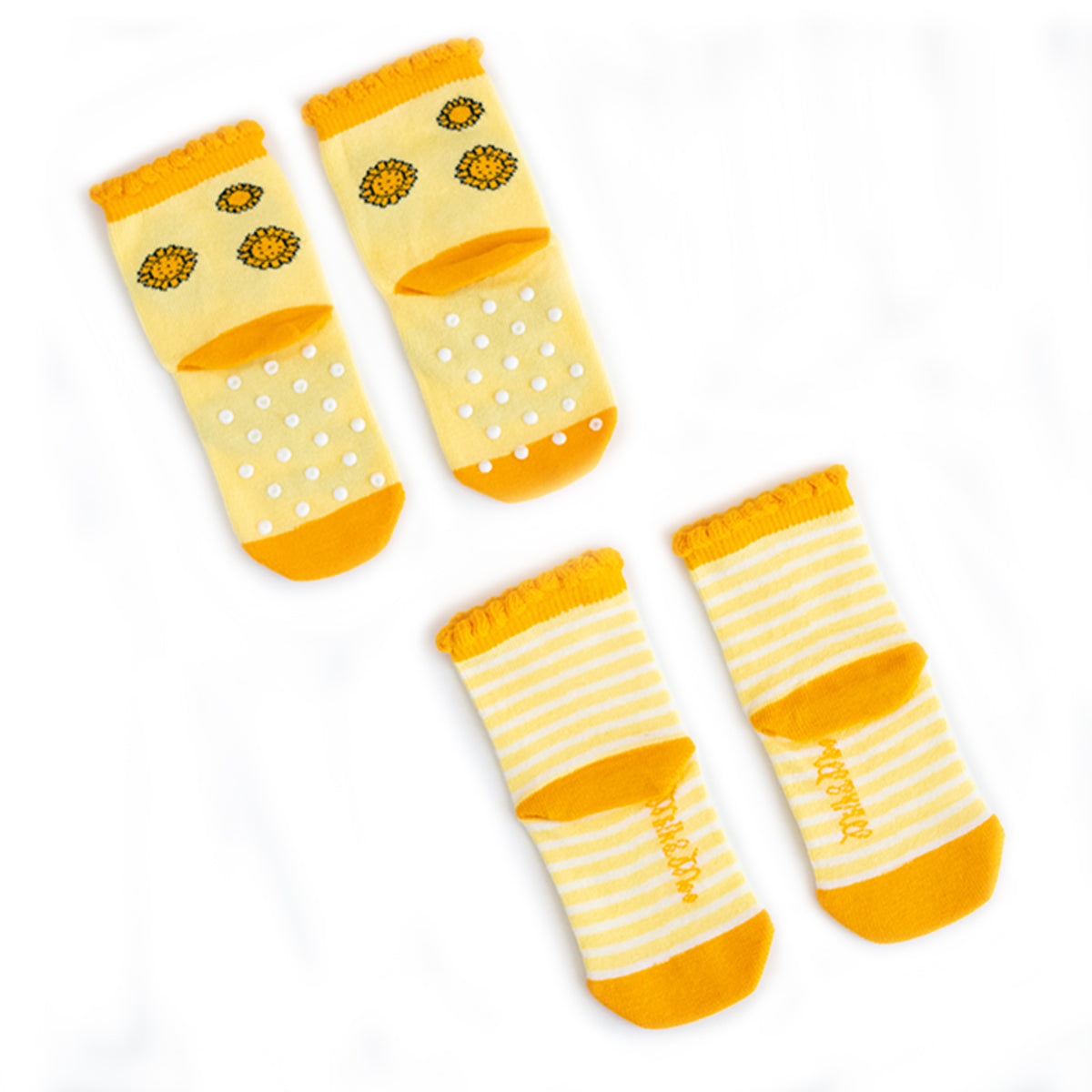 Milk&Moo Buzzy Bee und Chancin Mutter-Kind Socken Set mit bunten Designs für Babys und Mütter, hergestellt aus natürlicher Baumwolle.