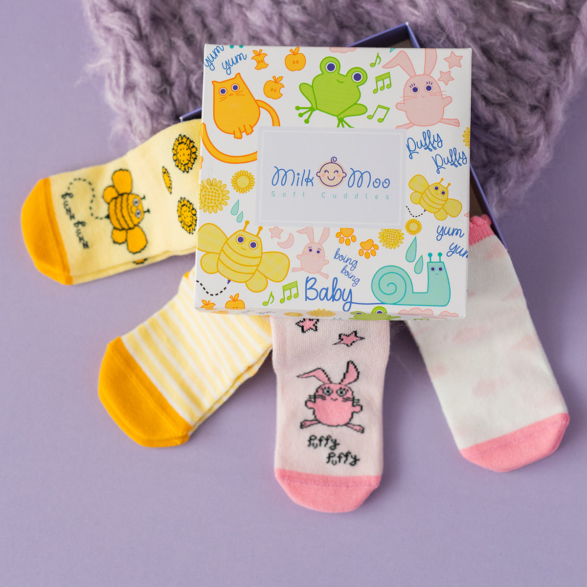 Milk&Moo Buzzy Bee und Chancin Baby Socken Set für 0-12 Monate, weich und rutschfest, in bunten Designs.