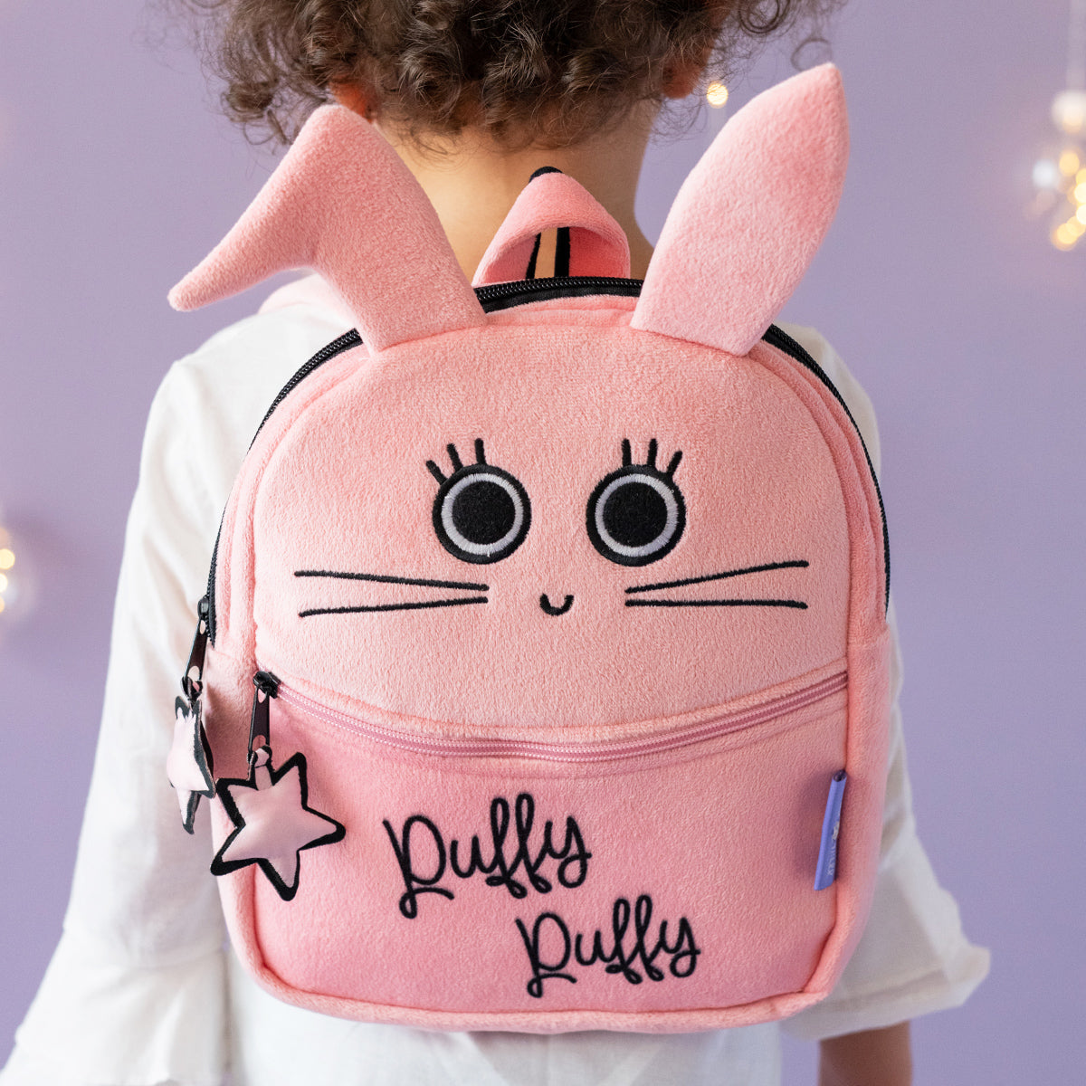 Milk&Moo Chancin Kinder Rucksack in rosa mit buntem Tierdesign und Stern-gemusterten Stickereien, ideal für Kinder.