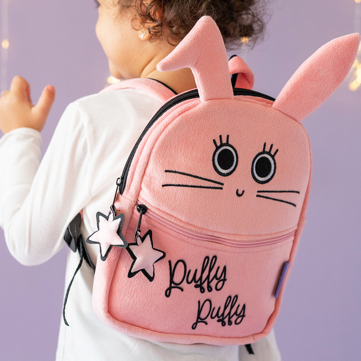 Milk&Moo Chancin Kinder Rucksack in rosa mit buntem Tierdesign und Stern-gemusterten Stickereien, ideal für Kinder.