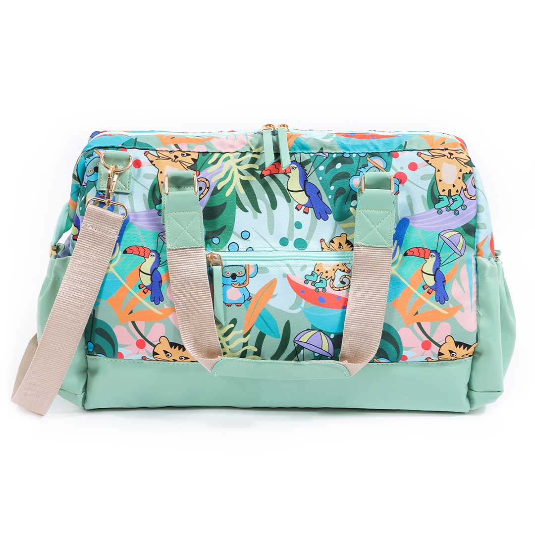 Milk&Moo Jungle Friends Wickeltasche in bunten Farben, aus hochwertigem Polyester und veganem Leder, mit praktischen Fächern und Trageoptionen.