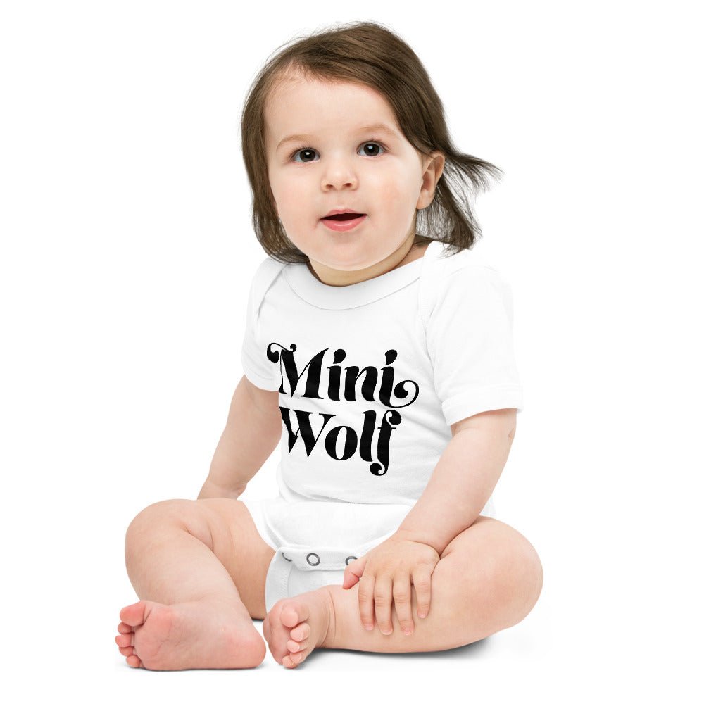 A cute Mini Wolf Onesie for babies featuring a charming wolf print, made from soft cotton with a comfortable design.