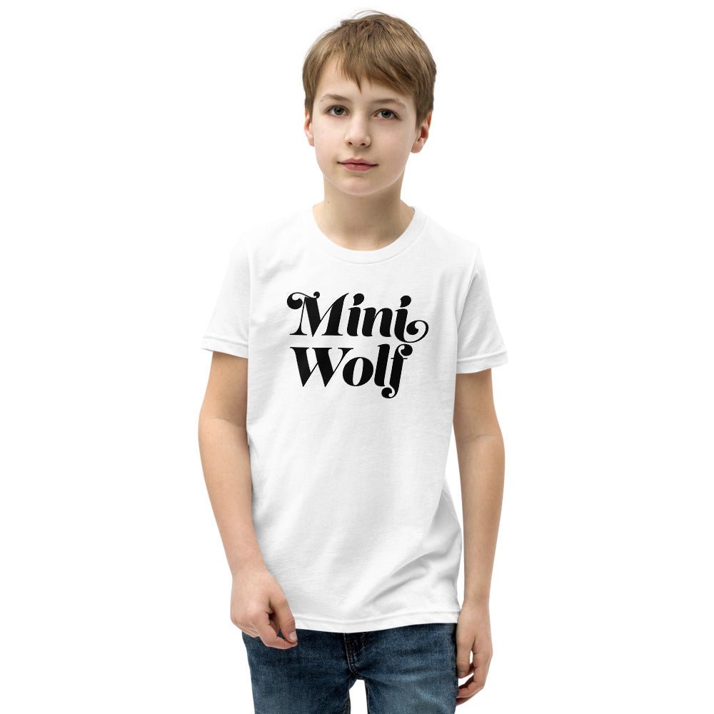 A soft cotton Mini Wolf Shirt for kids featuring a playful wolf graphic, perfect for outdoor adventures.