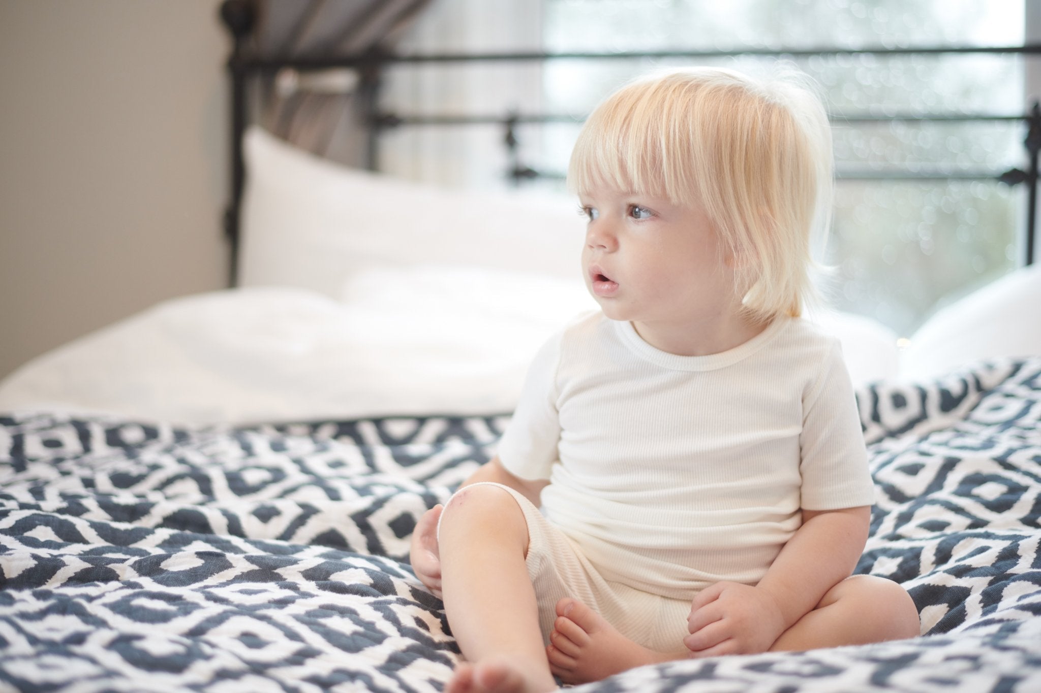 Moroccan Blue Cotton Muslin Newcastle Blanket, showcasing its soft, breathable fabric and stylish design, perfect for kids.