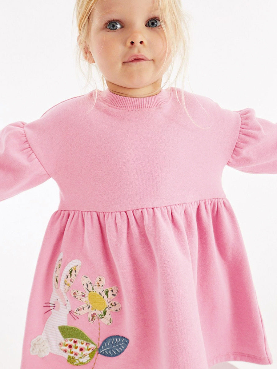 A pink long sleeve crew for girls featuring floral and rabbit patterns, made from soft cotton, perfect for autumn and spring wear.