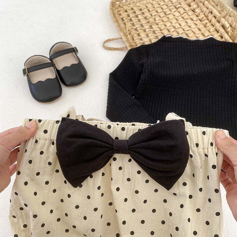 Black polka dot overall onesies for baby girls, made from cotton and polyester, perfect for spring and autumn.