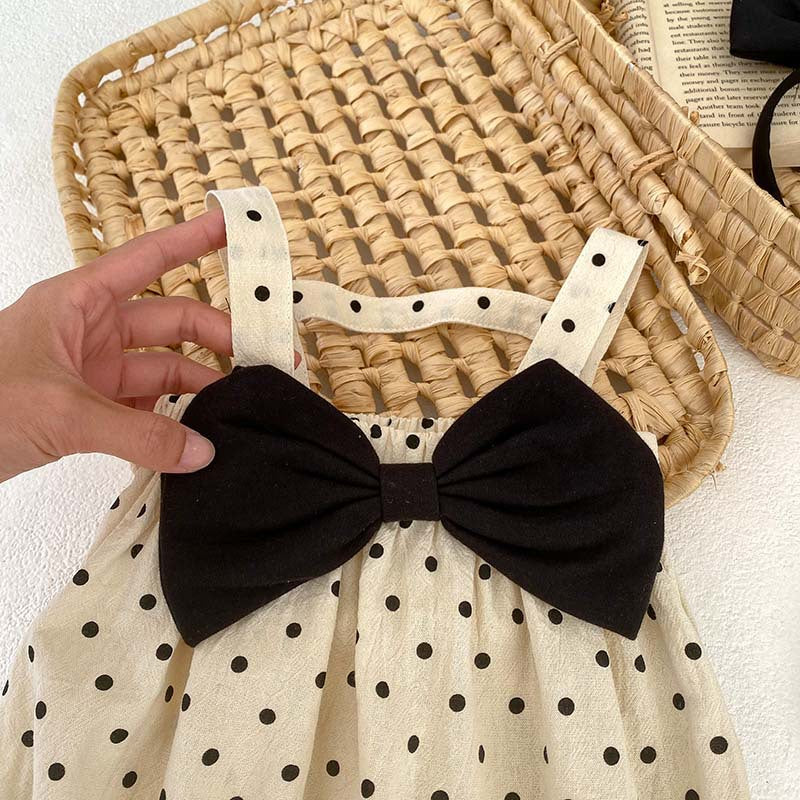 Black polka dot overall onesies for baby girls, made from cotton and polyester, perfect for spring and autumn.