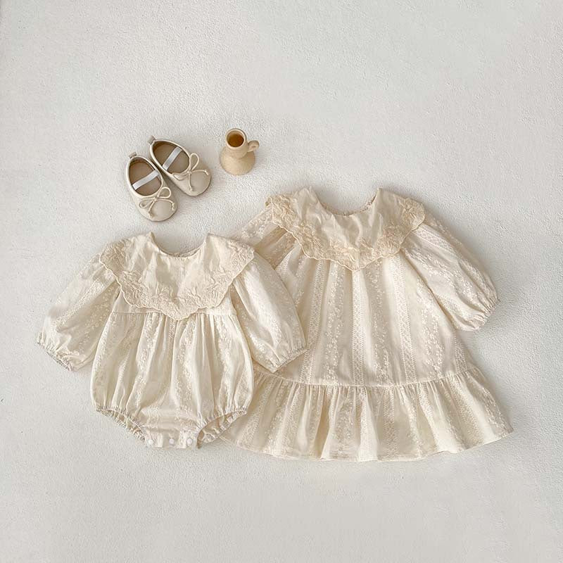 New Arrival Spring Baby Kids Girls Ruffle Collar Long Sleeves Floral dress in beige and apricot colors, featuring a floral pattern and ruffle collar.