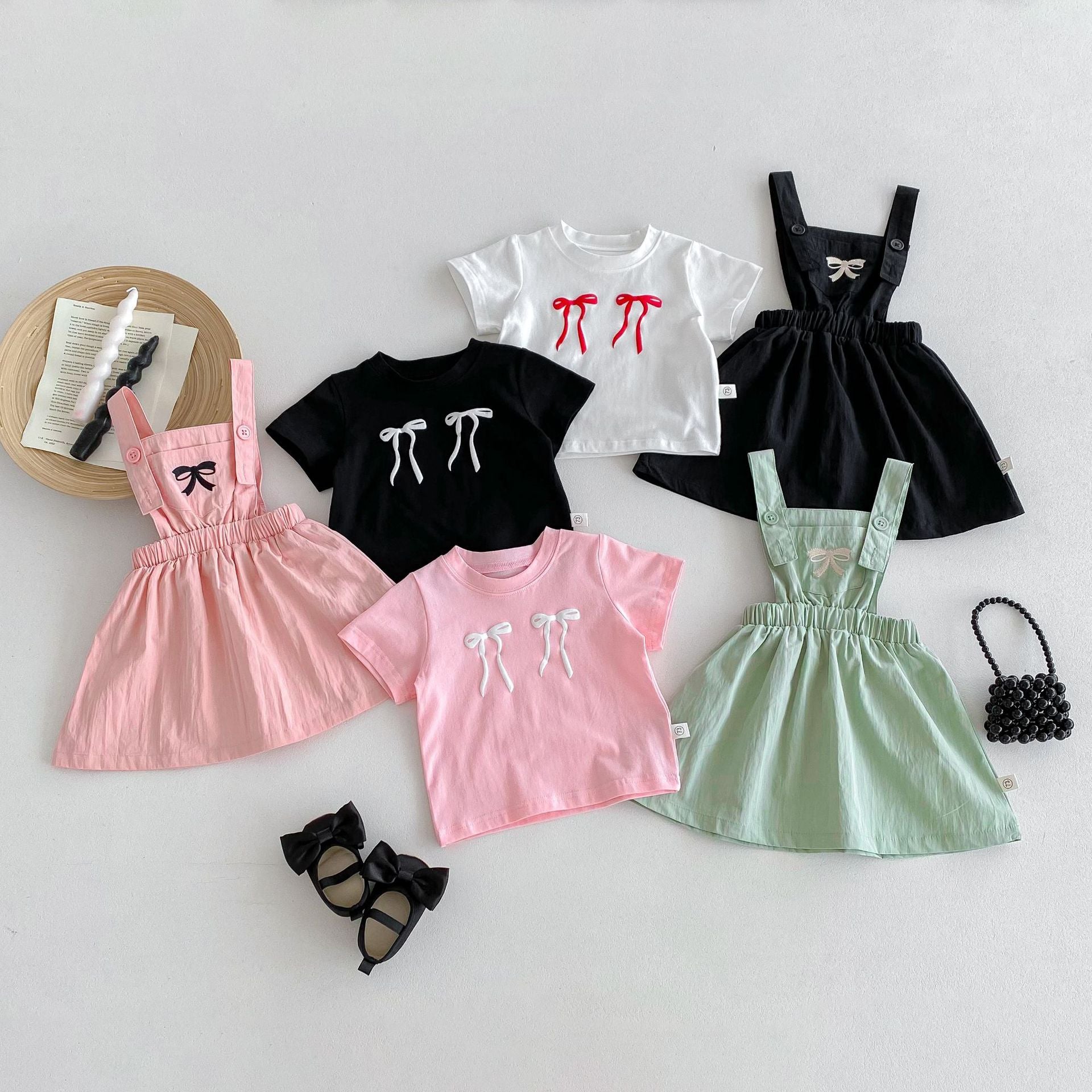 New Arrival Summer Baby Kids Girls outfit featuring a bow embroidery pattern in various colors.