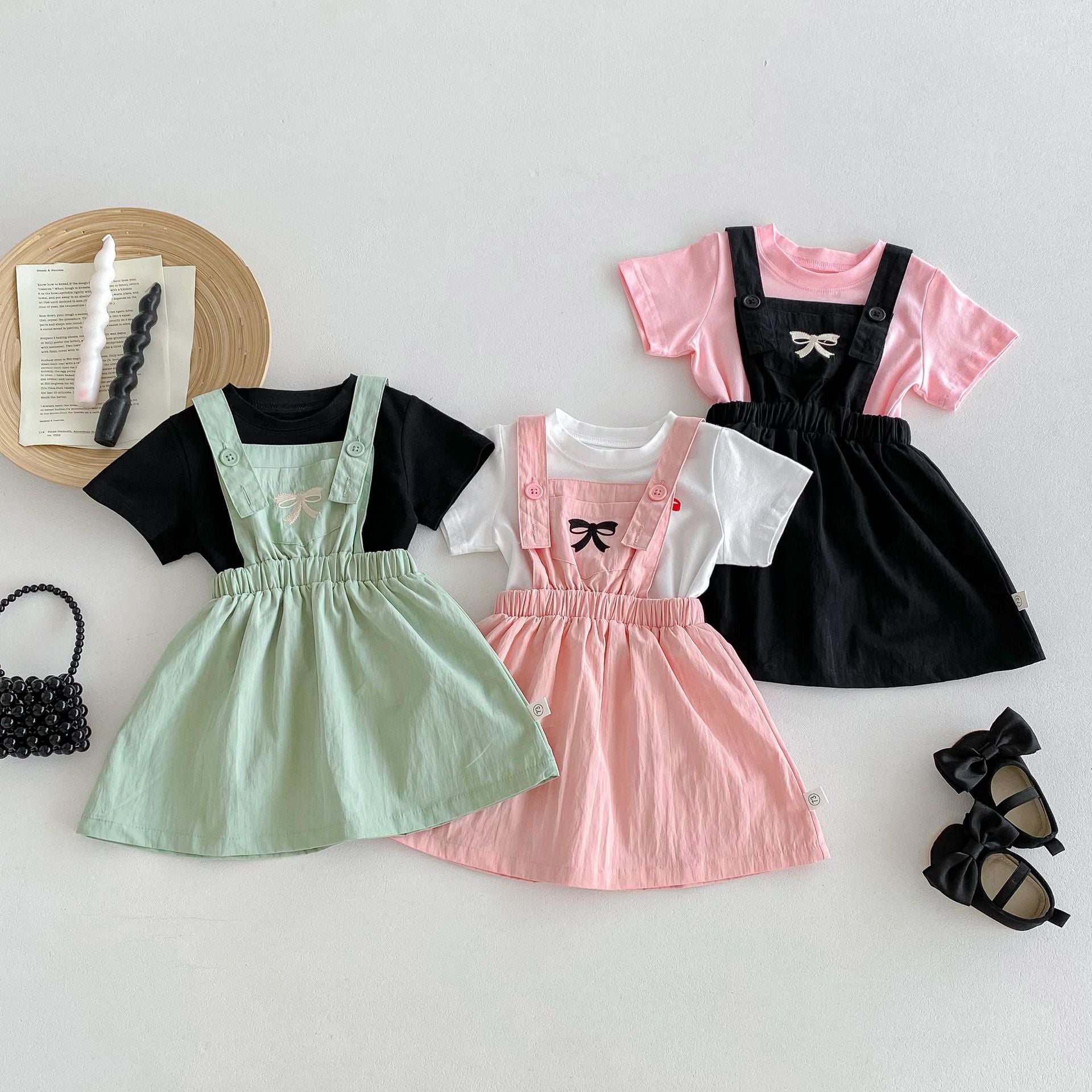 New Arrival Summer Baby Kids Girls outfit featuring a bow embroidery pattern in various colors.