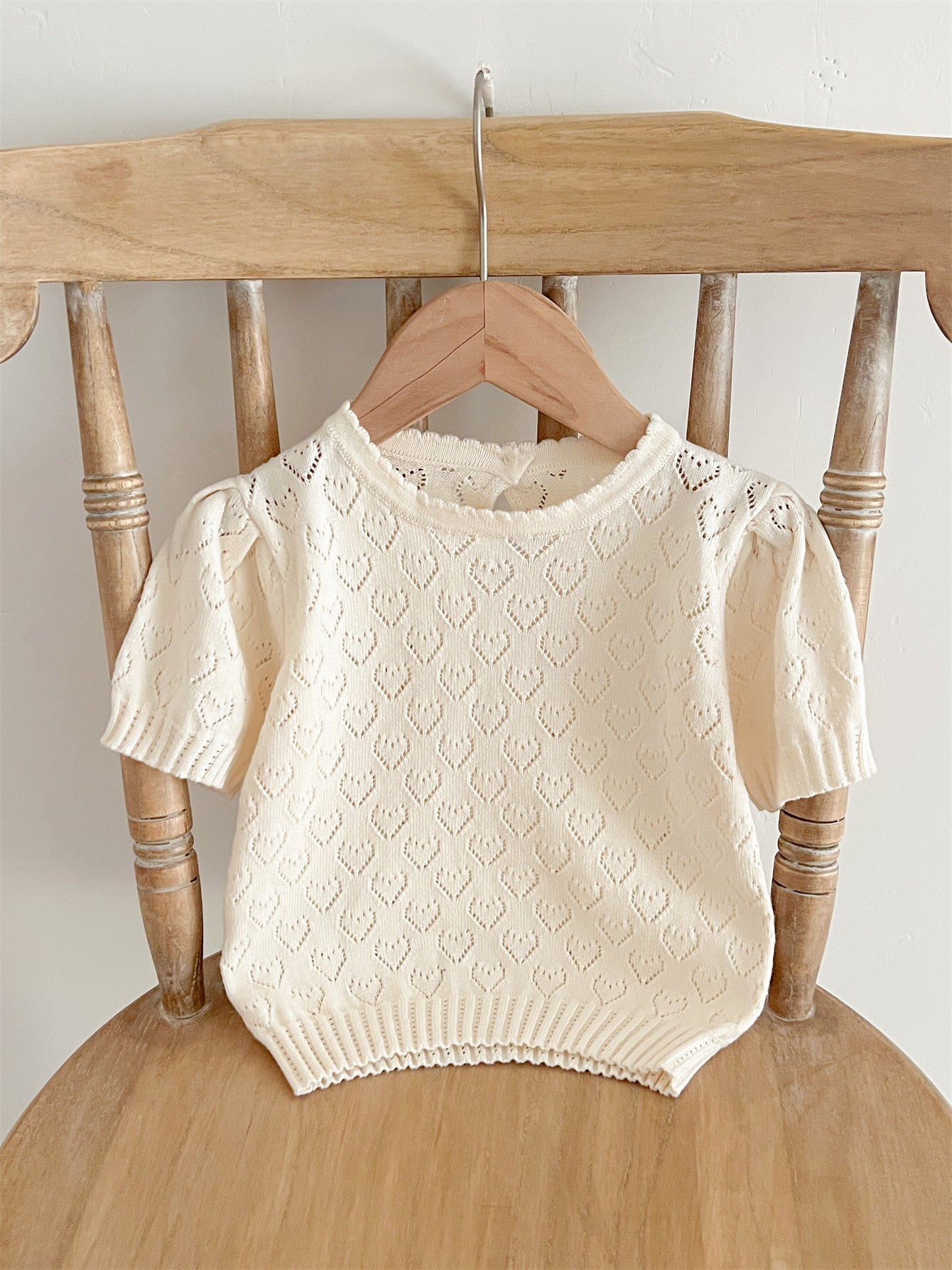 Summer baby girls knit hollow out heart pattern short in pink and beige, made from soft cotton, perfect for warm weather.