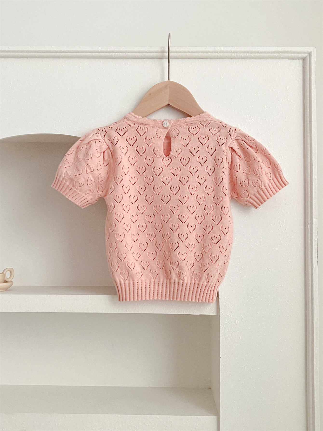 Summer baby girls knit hollow out heart pattern short in pink and beige, made from soft cotton, perfect for warm weather.