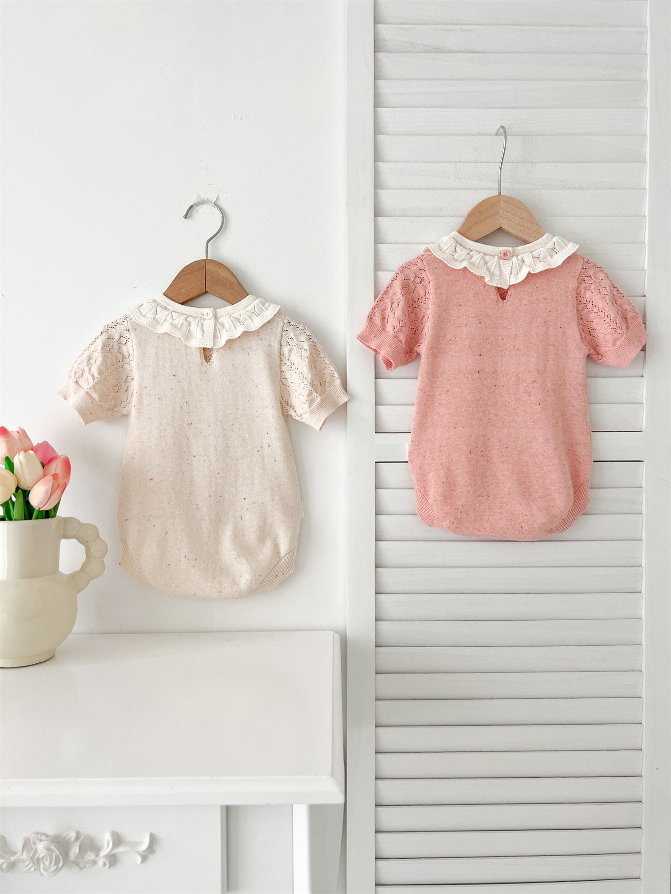 New Arrival Summer Baby Kids Girls Knitted Ruffled Collar Hollow Out dress in pink and beige, featuring a stylish ruffled collar and hollow-out design.