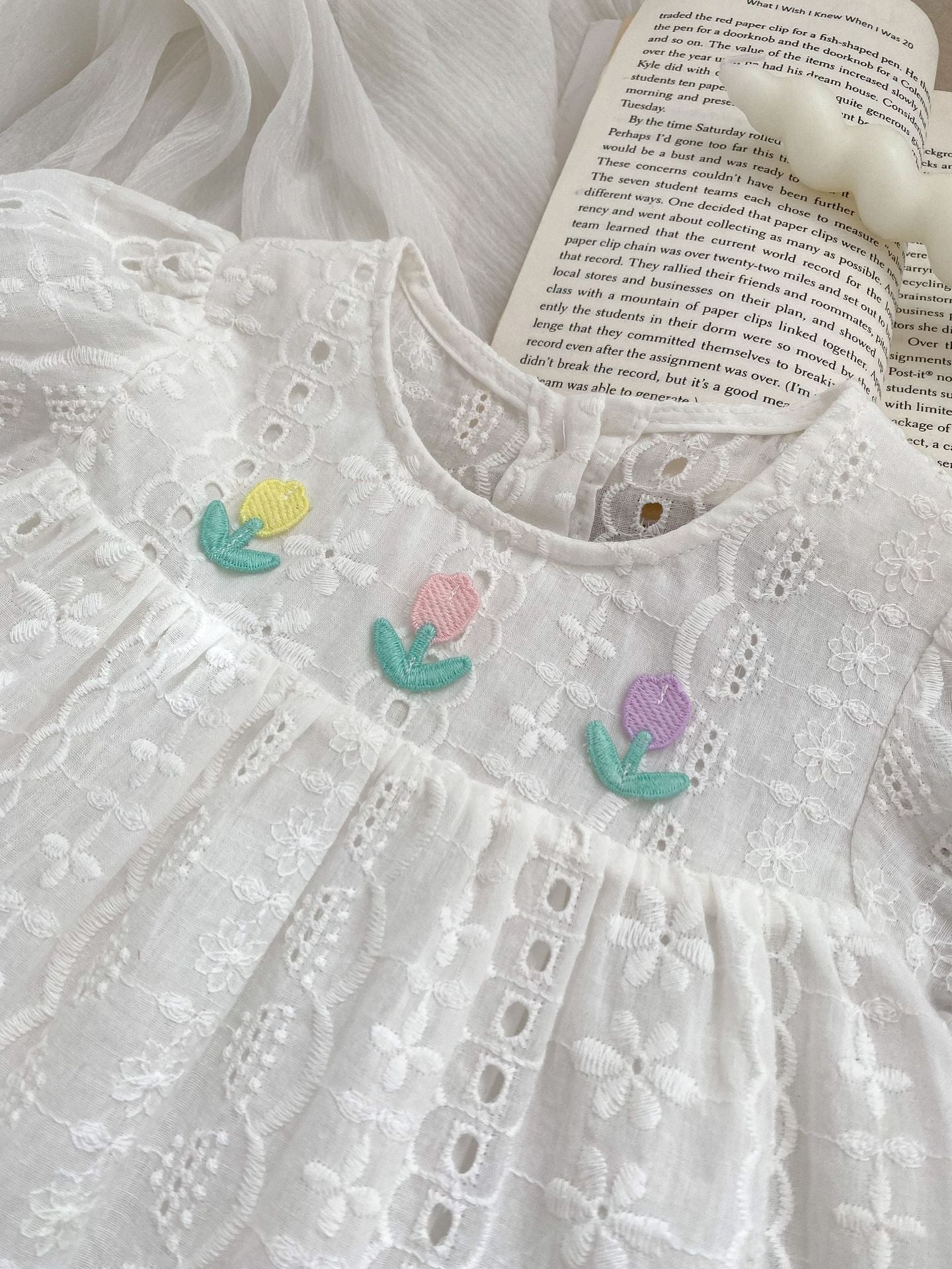 New Design Summer Girls Flowers Embroidery Crew Neck Short Sleeves in white cotton with floral patterns, perfect for baby girls.