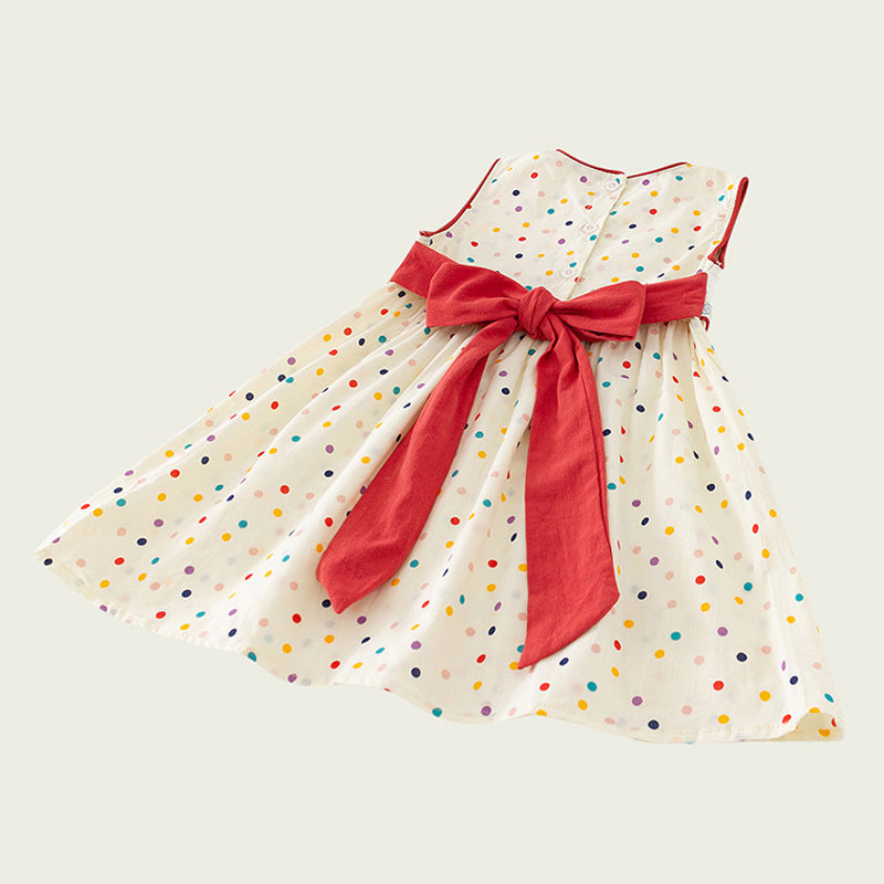 A cute summer outfit for girls featuring colorful dots and sailing boats design in beige color, made from soft cotton fabric.