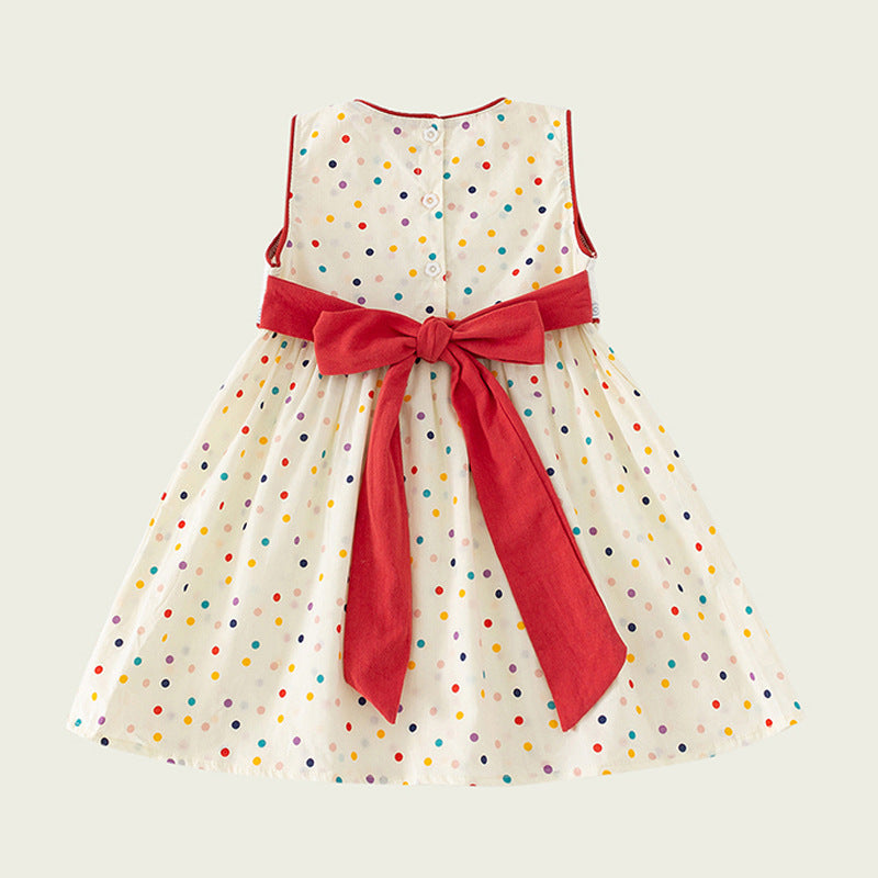 A cute summer outfit for girls featuring colorful dots and sailing boats design in beige color, made from soft cotton fabric.