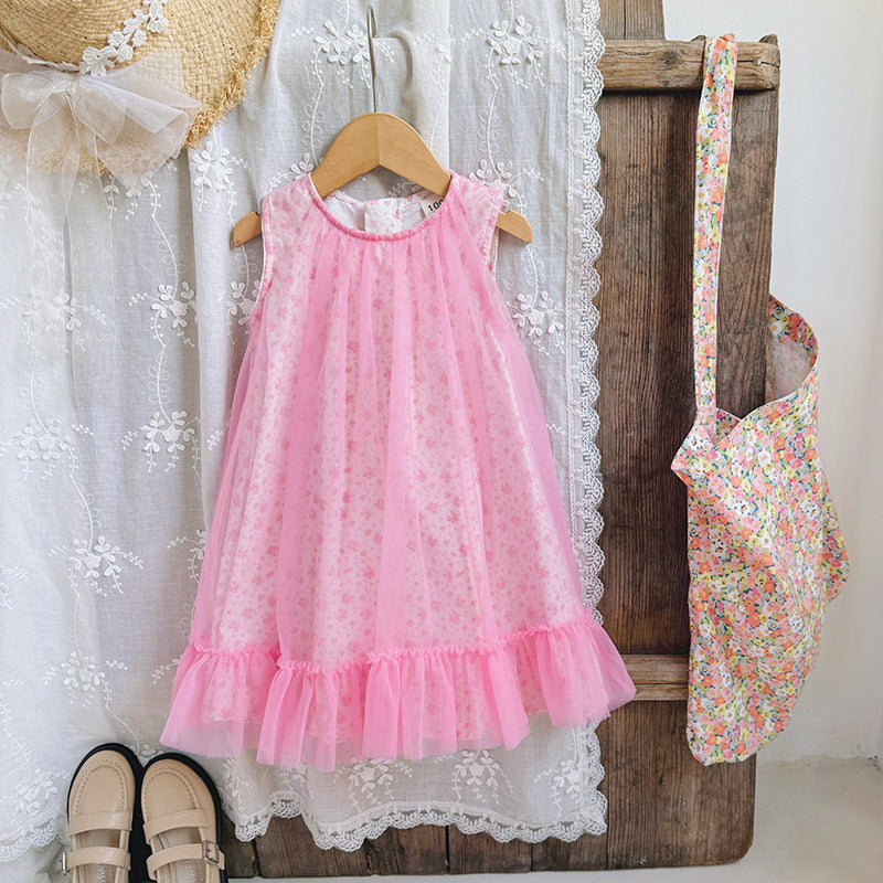 A cute summer dress for girls featuring a floral print, sleeveless design, and lightweight mesh fabric in pink color.