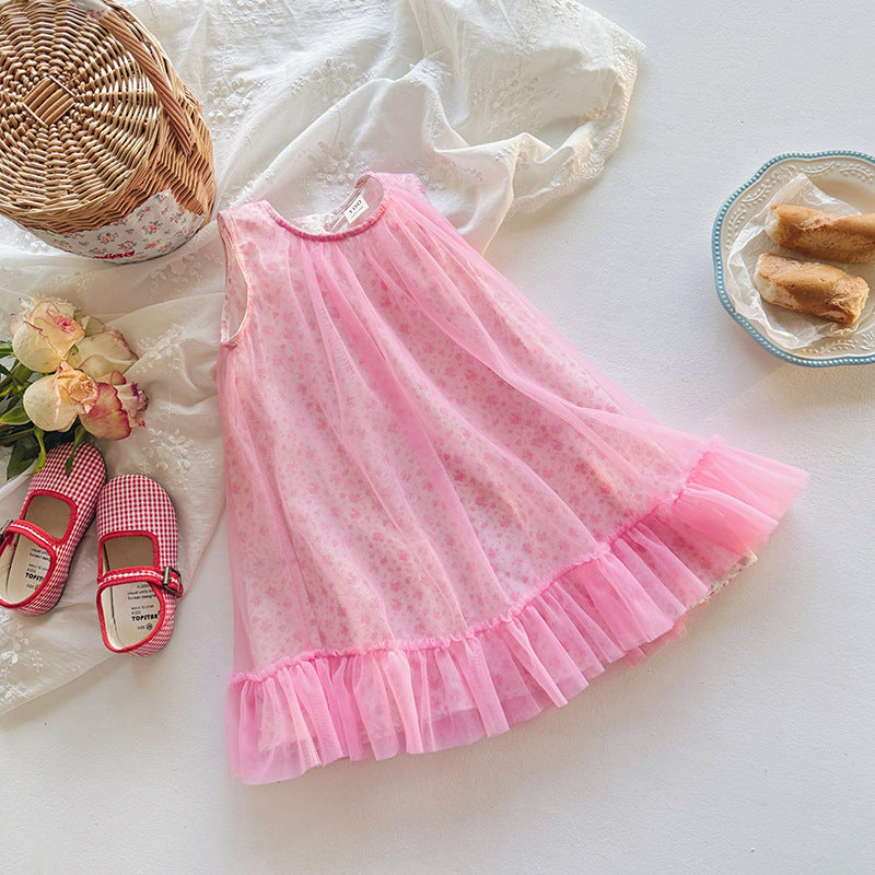 A cute summer dress for girls featuring a floral print, sleeveless design, and lightweight mesh fabric in pink color.