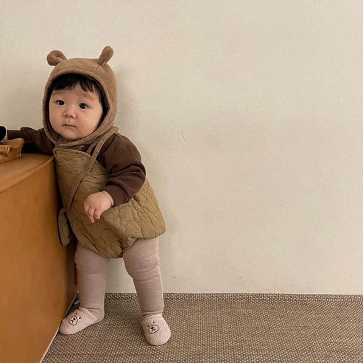 New Winter Infant Baby Solid Thick Warm Vest in beige and coffee colors, designed for infants with a soft cotton material.