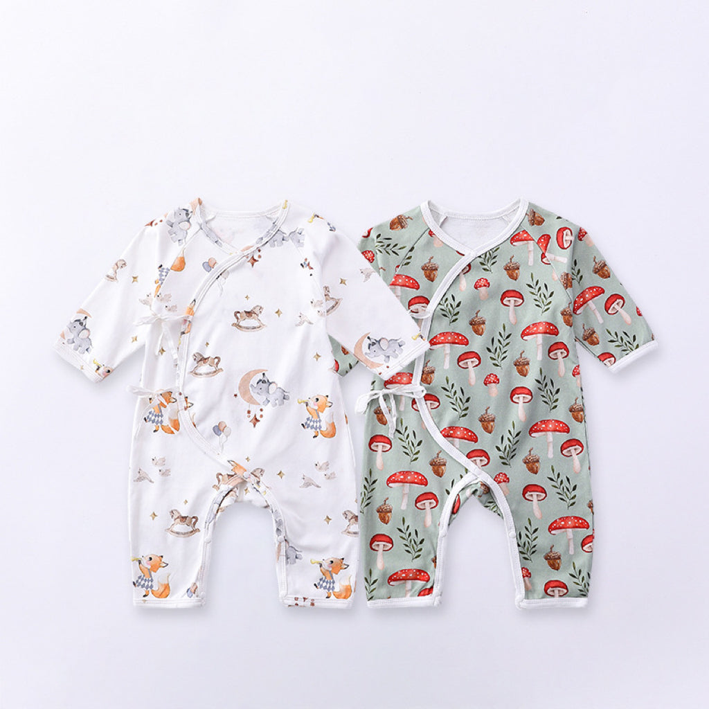 Newborn Autumn Belted Rompers in white and green colors, featuring floral and cartoon patterns, made from soft cotton material.