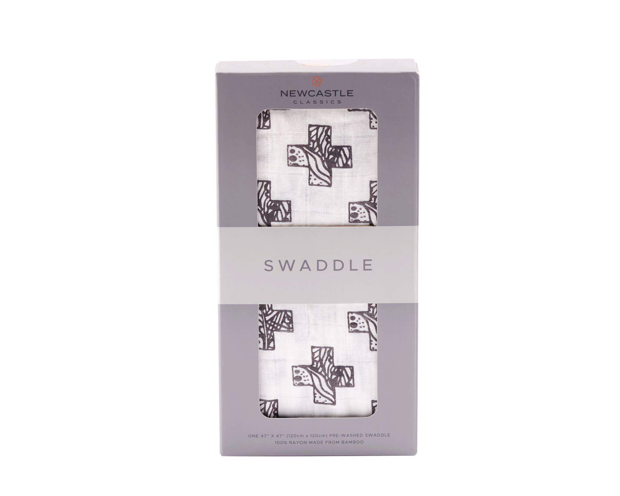 Newcastle Classics Nordic Cross Swaddle in soft bamboo muslin, featuring a stylish Nordic Cross pattern, perfect for swaddling and multi-functional use.