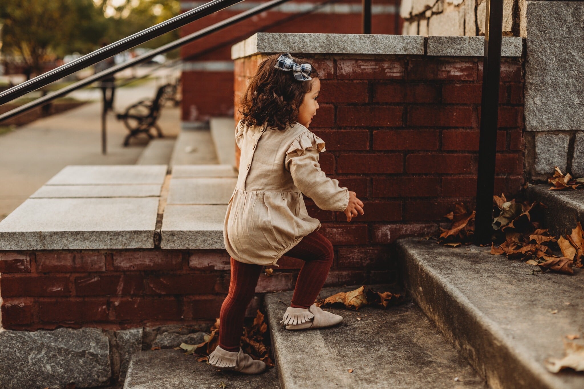 Oatmeal Linen Flutter Sleeve Romper for babies, featuring soft linen fabric and diaper snaps.