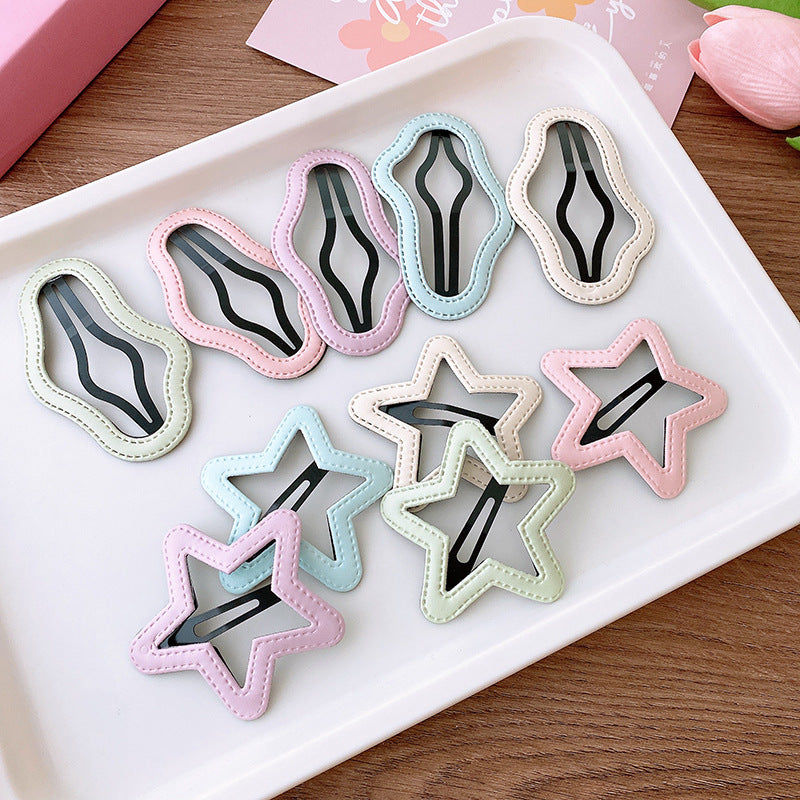 Five candy-colored hollow out star and cloud shaped hair clips for girls, featuring pink and light pink colors.