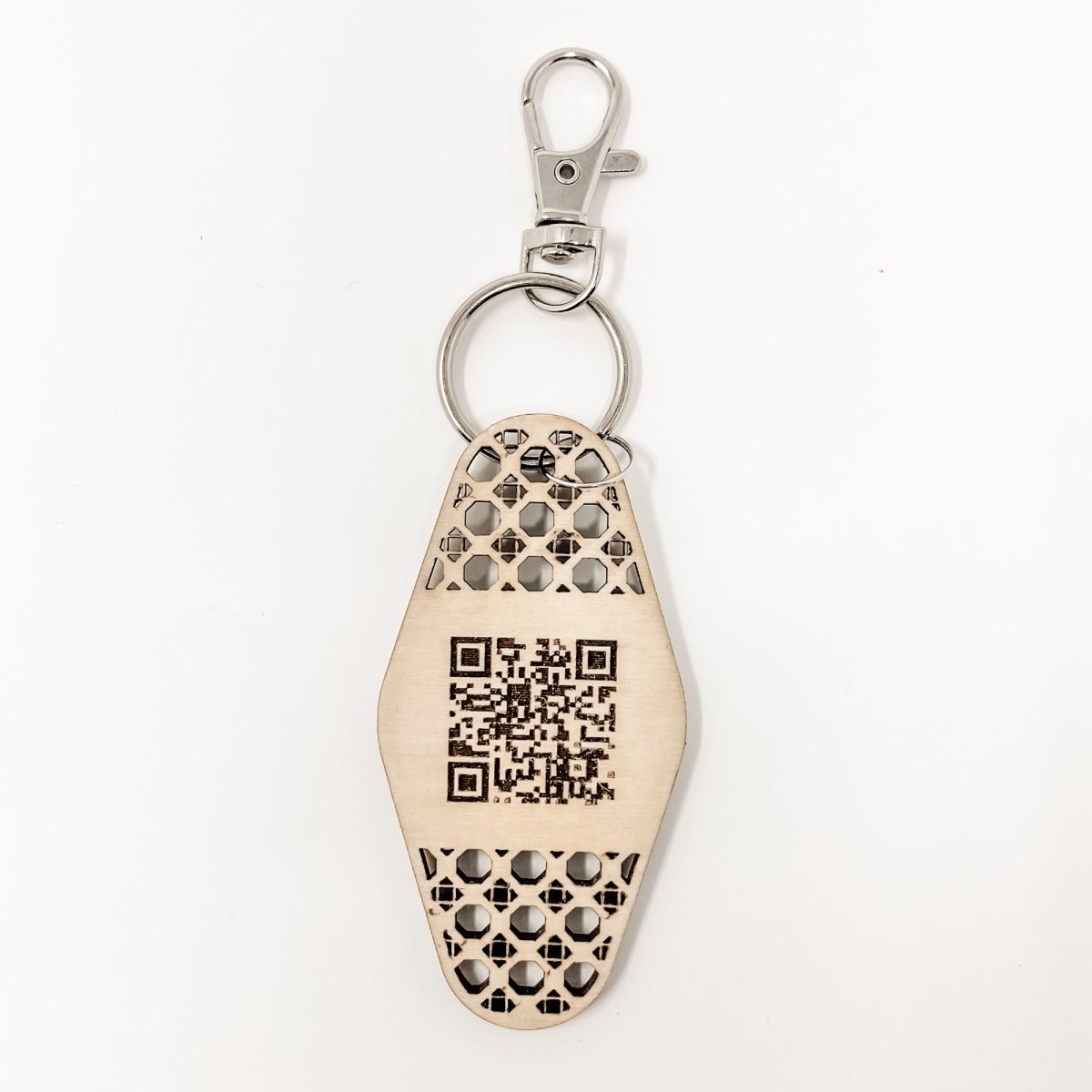 Personalized Business Rattan Keychain with QR Code and suede tassel in various colors, showcasing its elegant design and functionality.