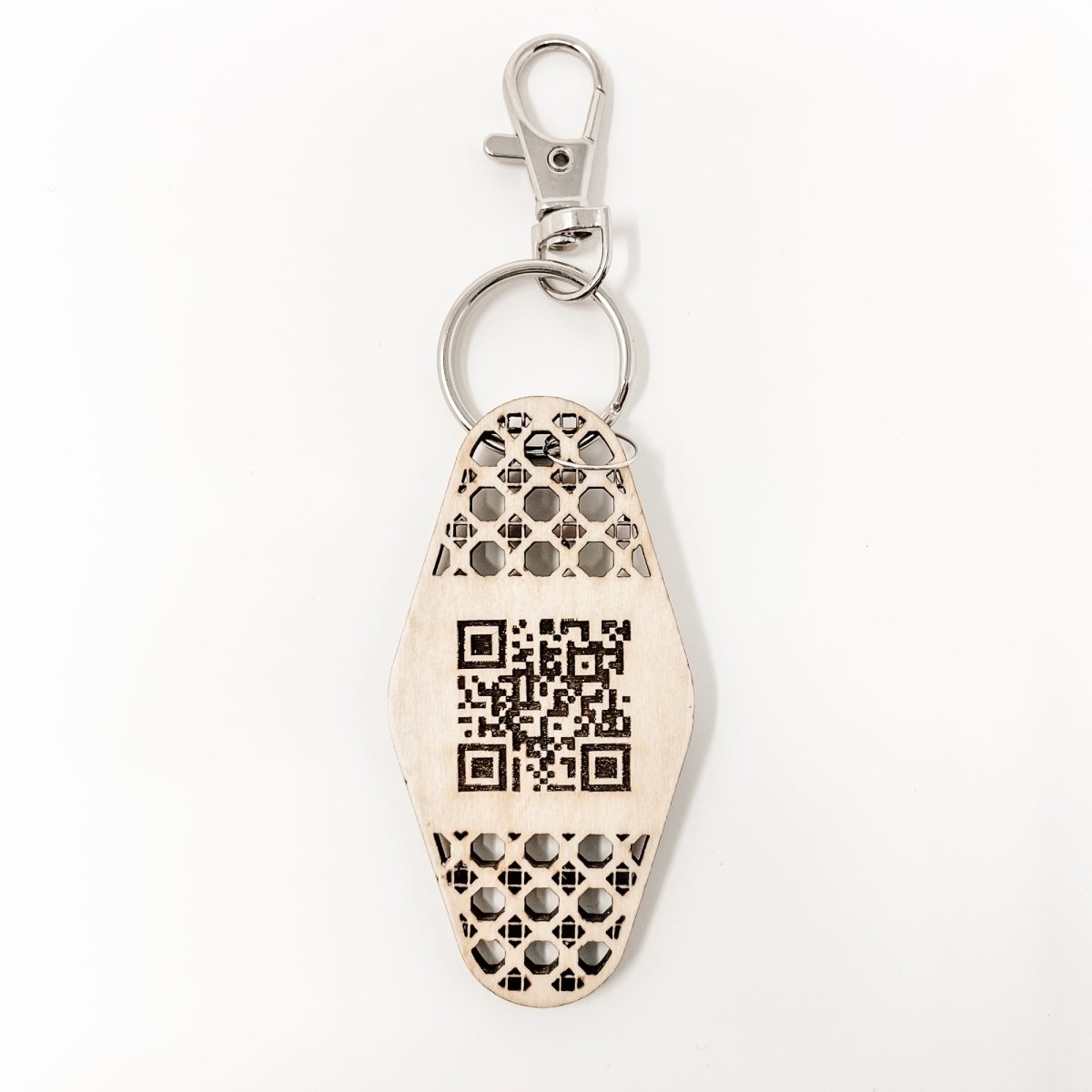 Personalized Business Rattan Keychain with QR Code and suede tassel in various colors, showcasing its elegant design and functionality.