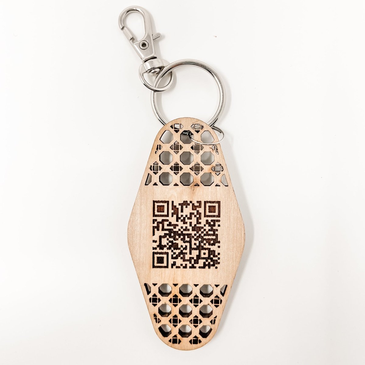 Personalized Business Rattan Keychain with QR Code and suede tassel in various colors, showcasing its elegant design and functionality.