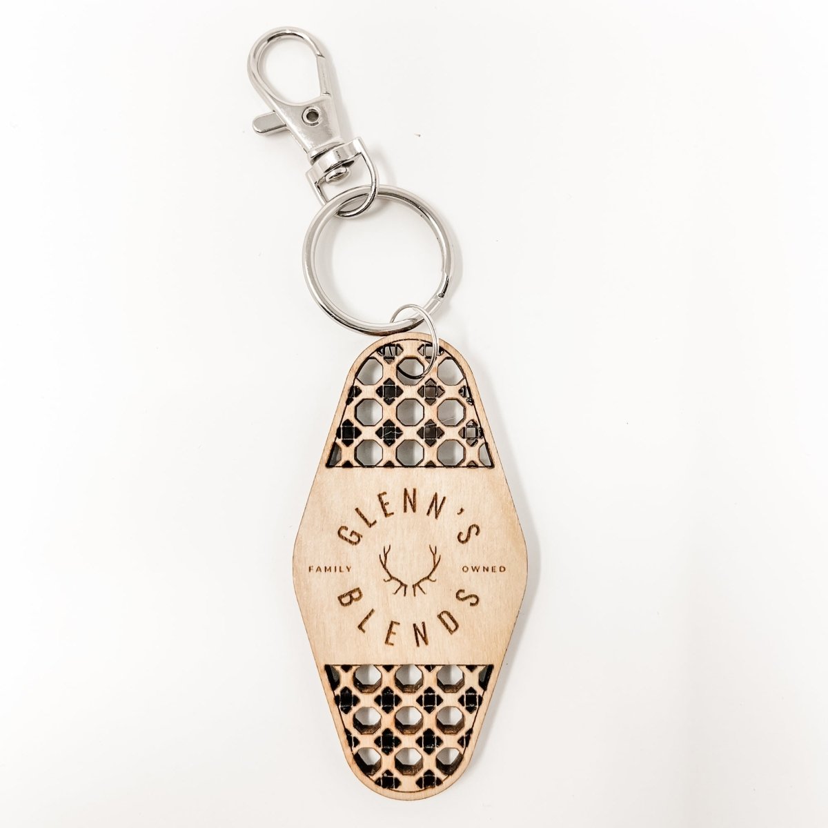 Personalized Business Rattan Keychain with QR Code and suede tassel in various colors, showcasing its elegant design and functionality.