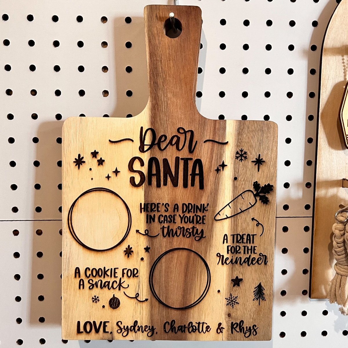 Personalized wood Santa tray cutting board with custom engraving, perfect for holiday treats and baking.