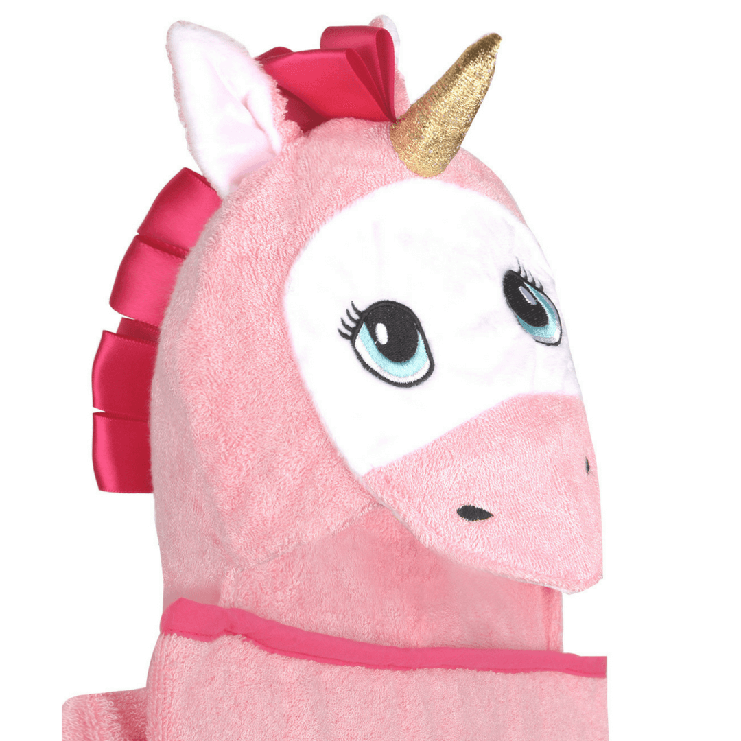 A soft and plush pink unicorn hooded towel designed for babies, featuring a cute unicorn face and ears on the hood.