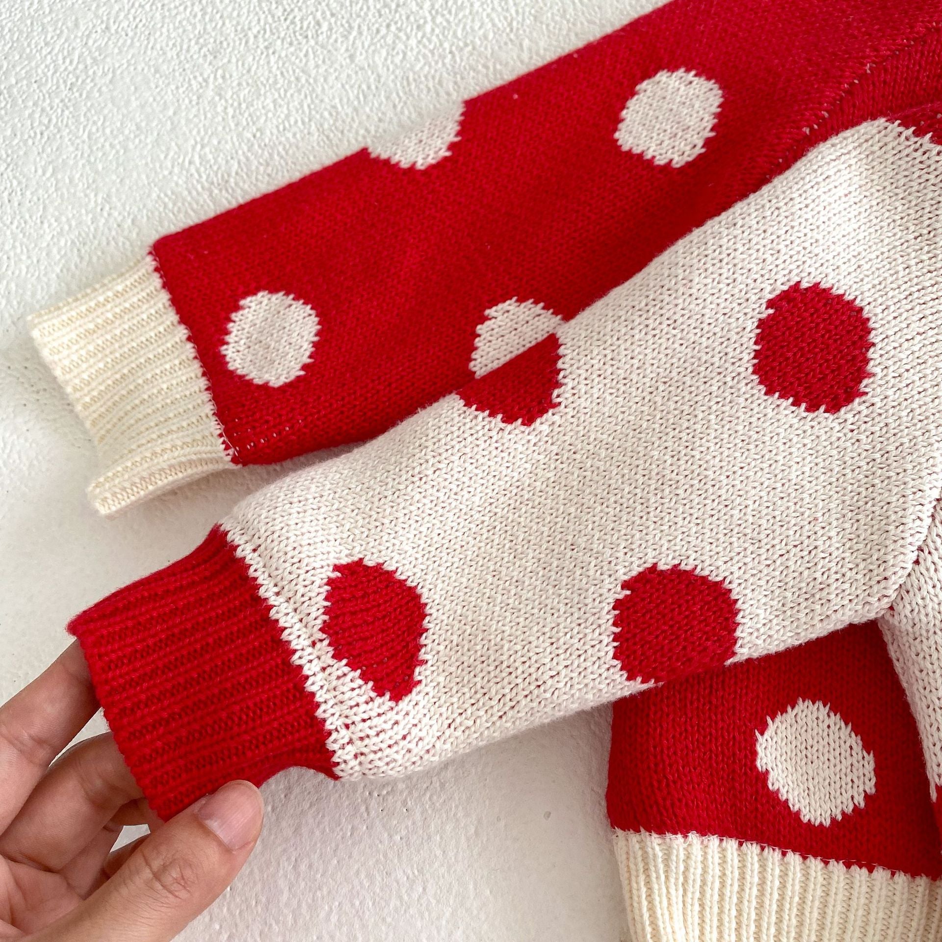 Pompom Design Velvet-In Top Combo Knitwear Pants set for baby girl in red and beige colors, featuring a stylish patchwork design.