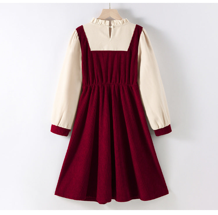 A stylish Preppy Corduroy Long Sleeves Ruffle Crew Neck Thick Dress in red and brown, perfect for winter wear for girls.