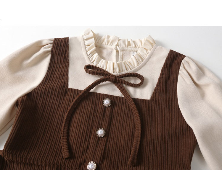 A stylish Preppy Corduroy Long Sleeves Ruffle Crew Neck Thick Dress in red and brown, perfect for winter wear for girls.