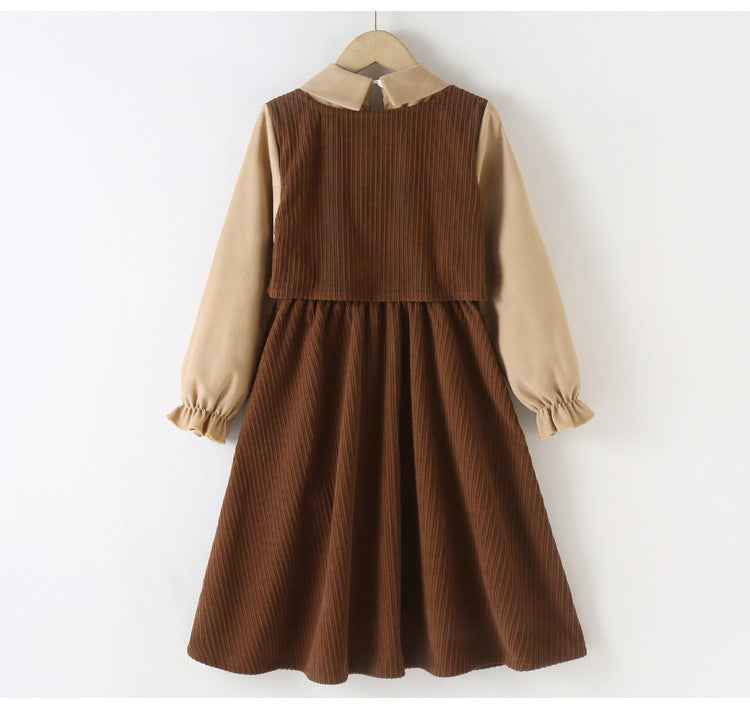 A stylish brown corduroy dress with long sleeves and a turndown collar, perfect for winter wear for girls aged 5-12.