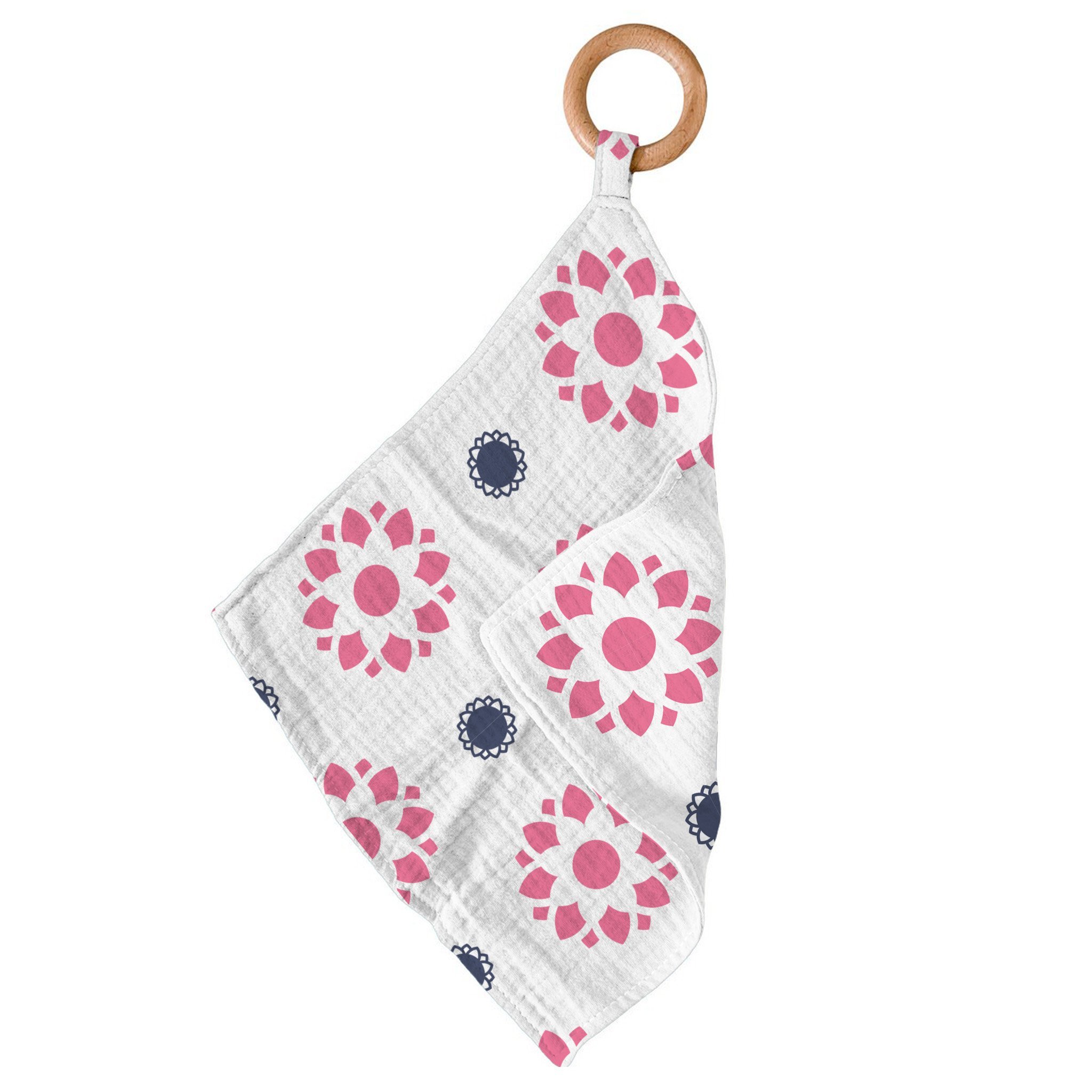 Primrose Indigo Cotton Blankie Teether featuring a soft cotton fabric and a removable beach wood ring for teething relief.