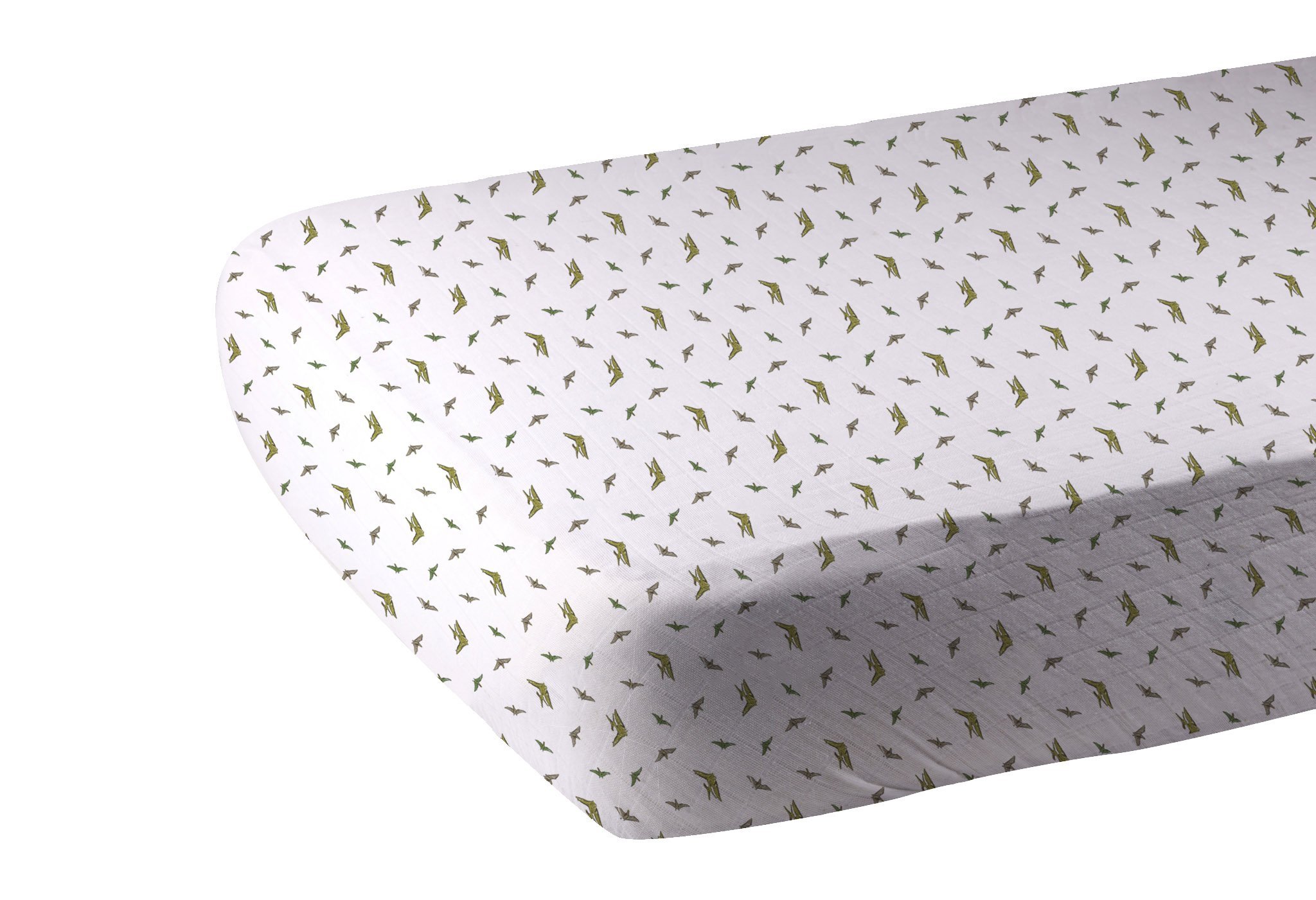 Pteranodon Cotton Muslin Crib Sheet featuring a playful dinosaur print, soft and breathable fabric, perfect for standard crib mattresses.