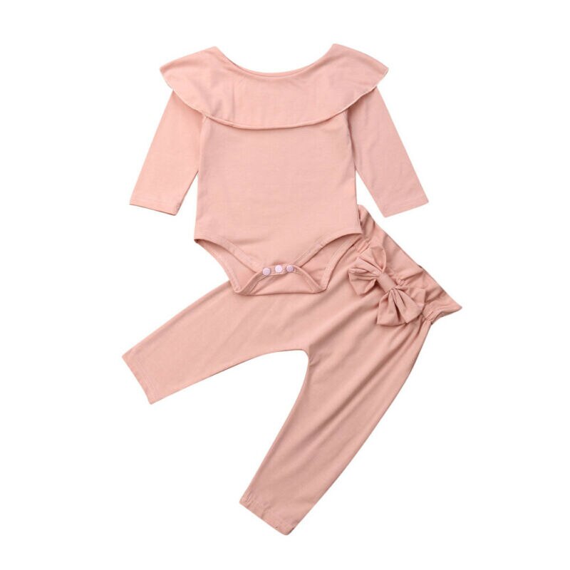 Pink baby outfit with pants.