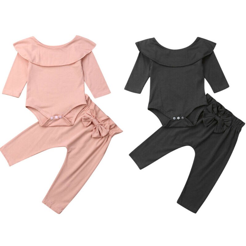 Pink and gray baby outfits.