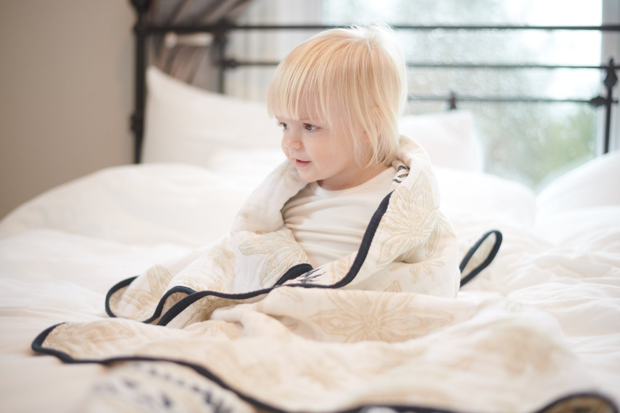 Pyramid and Boho Fields Cotton Muslin Newcastle Blanket featuring vibrant patterns and soft texture, perfect for kids.