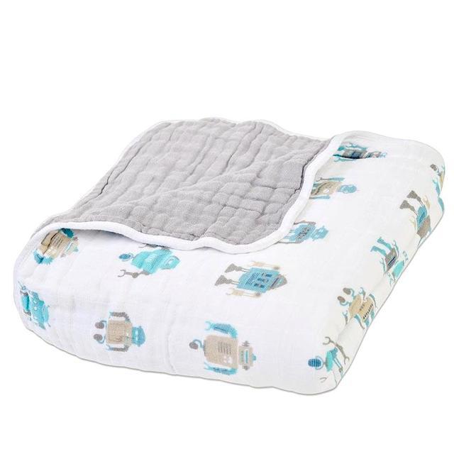 Robots Cotton Muslin Newcastle Blanket featuring playful robot designs in vibrant colors, made from soft and breathable natural cotton muslin.