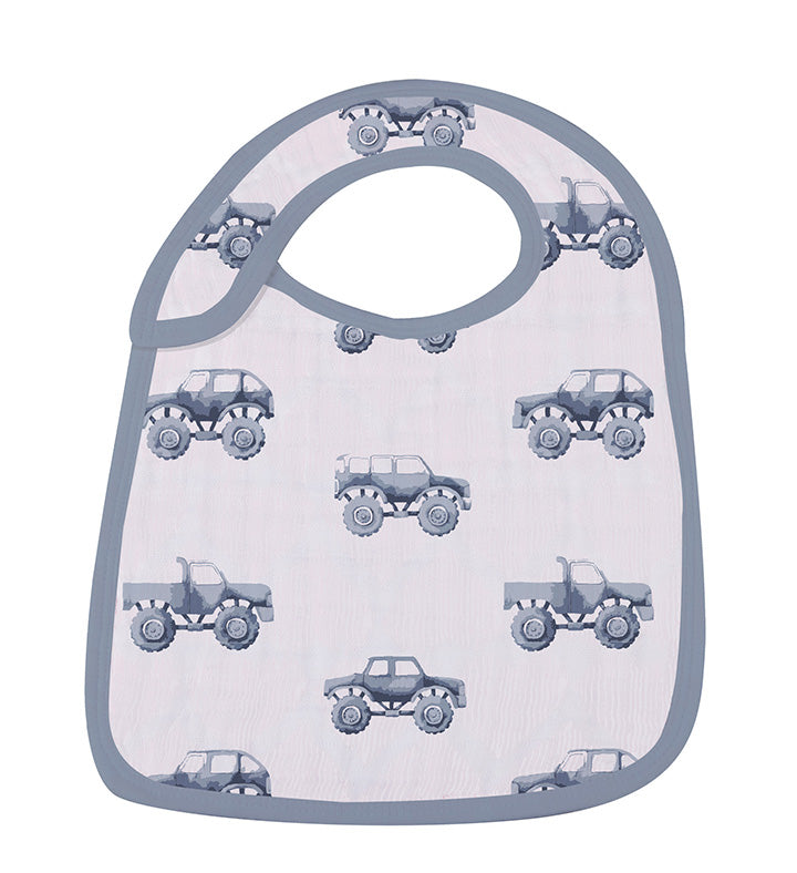 Rough Terrain Cotton Snap Bibs in soft natural cotton, featuring multiple snaps for adjustable fit and extra absorbent fabric for feeding and teething.