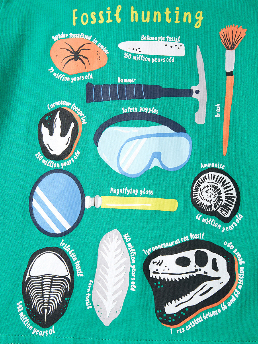 Round neck green t-shirt for boys featuring a cartoon fossil hunting design, made from soft cotton material.