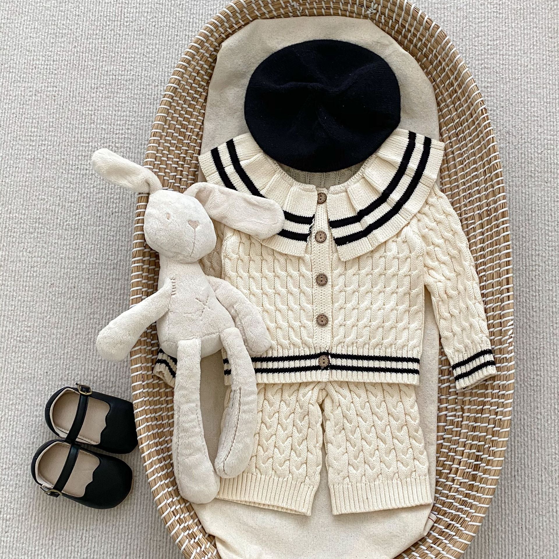 A beige knitted clothing set for girls featuring a sailor collar and striped pattern, perfect for spring and autumn wear.