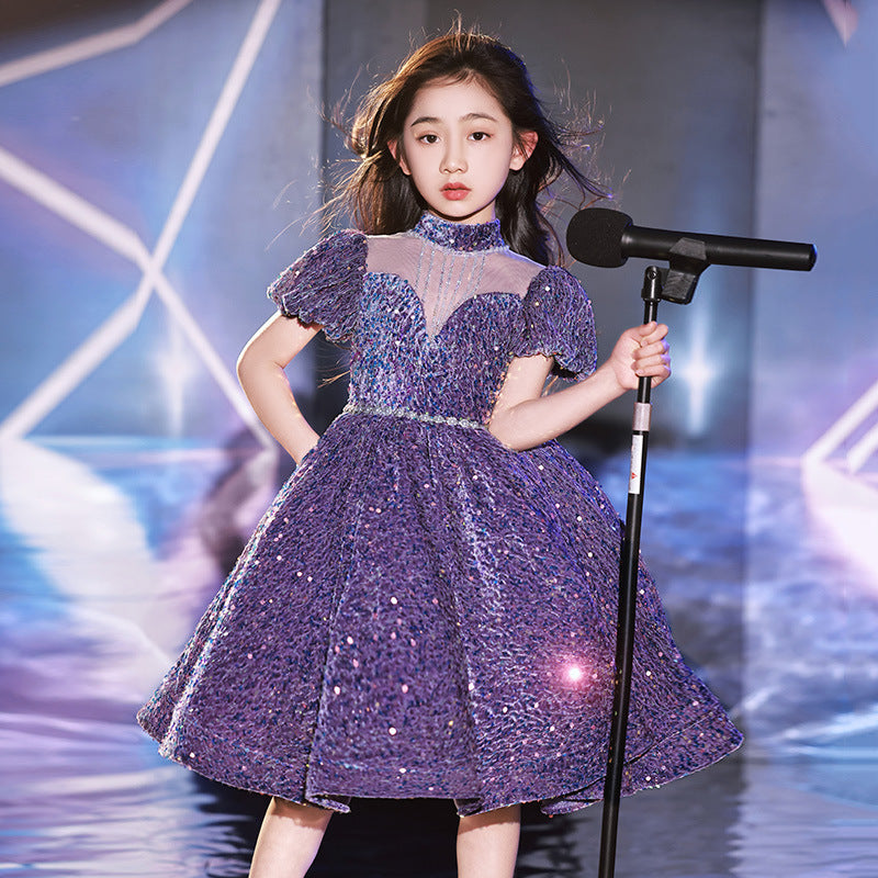 A beautiful Shimmering Hostess Evening Gown for girls in black and purple, featuring a dots pattern, perfect for piano performances.