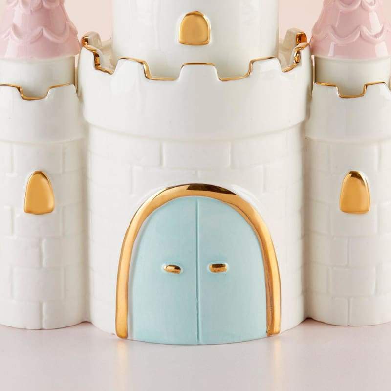 Simply Enchanted Castle Porcelain Bank featuring three towers with pink tops, light blue doors, and gold detailing.