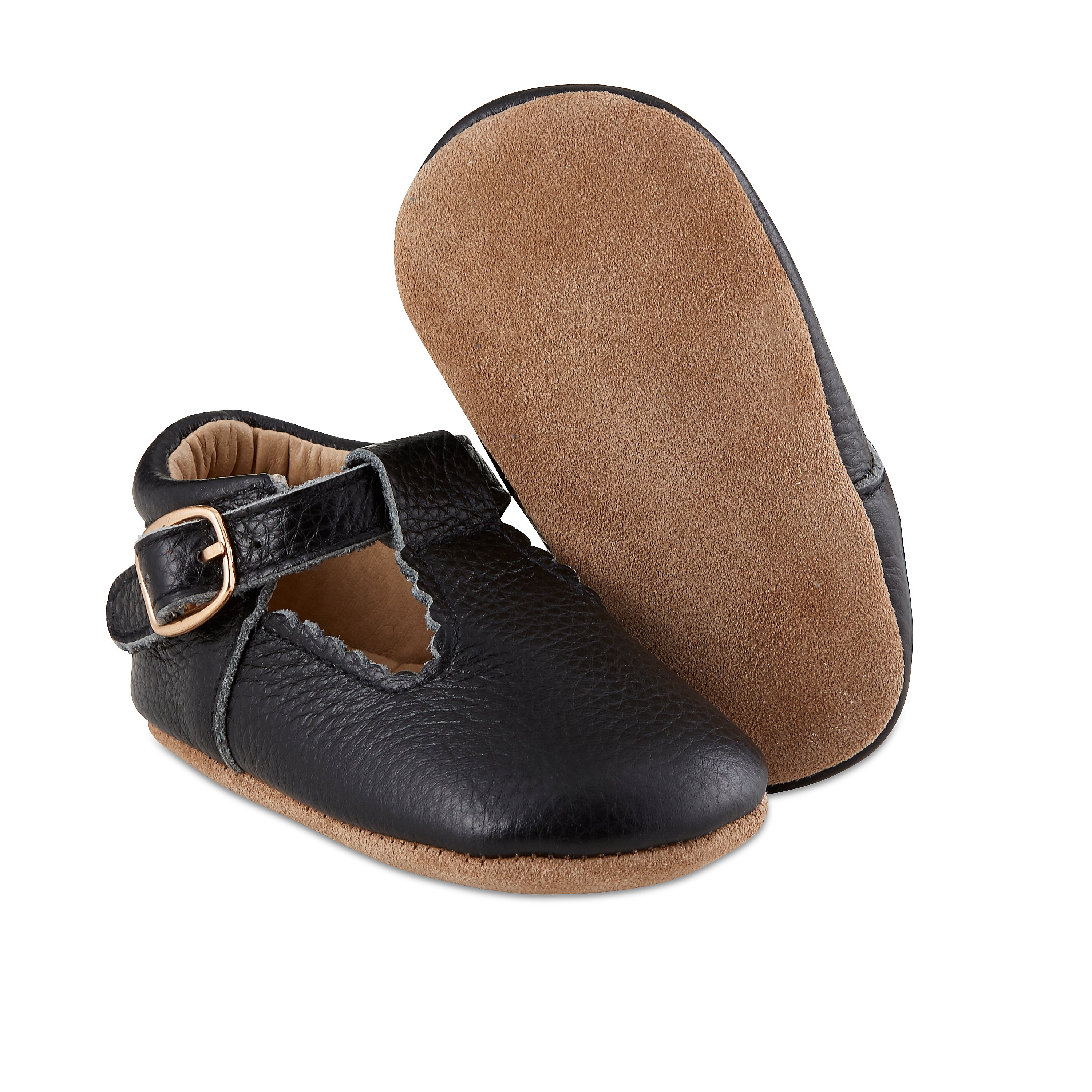 Soft-Sole Leather Mary Jane Moccasins in black, featuring a t-strap buckle design for easy wear and soft leather soles for comfort.