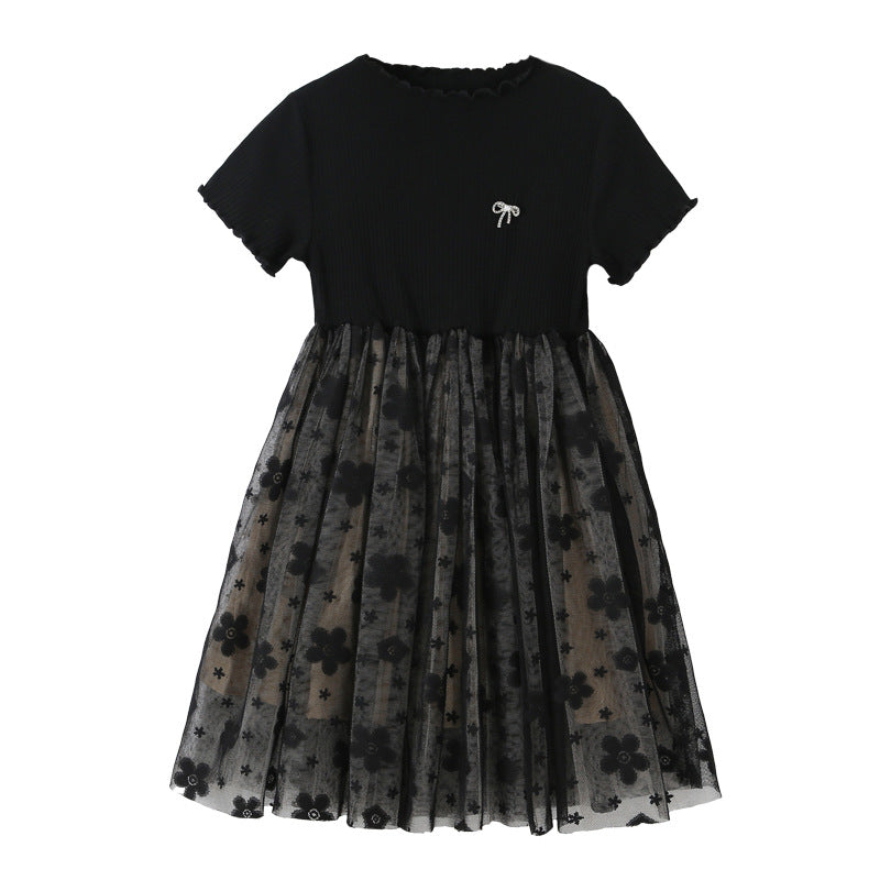 A stylish solid black short sleeve mesh dress for girls, perfect for summer wear, made from soft cotton material.